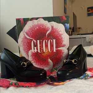 Gucci Women's Black Leather Loafers with Gold Detail